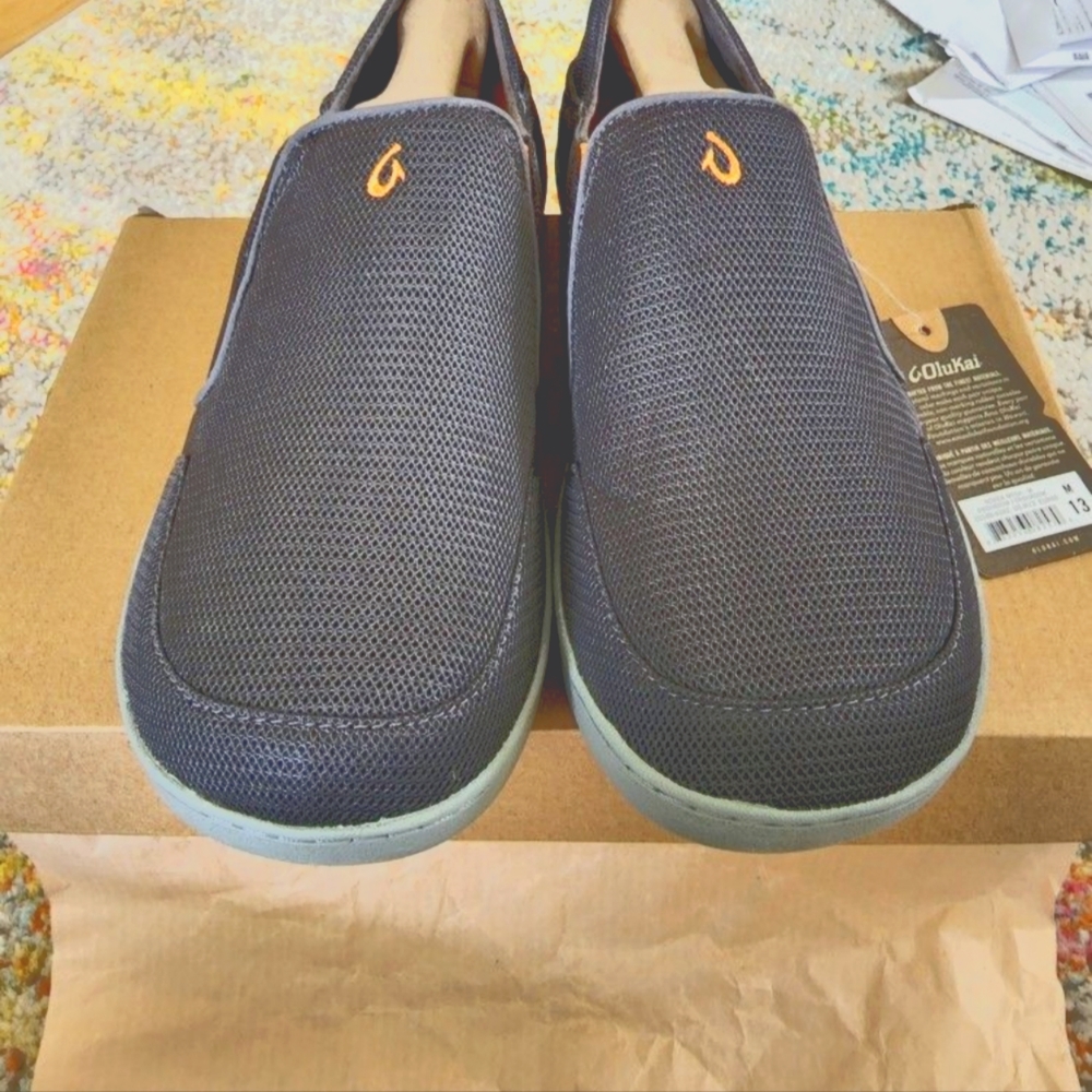 Brand new Olukai Men's shoes.